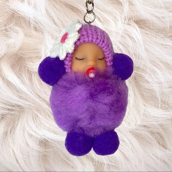 SLEEPY BABY WITH PACIFIER SMALL POMPON IN PURPLE KEYCHAIN CHARM - Picture 1 of 6